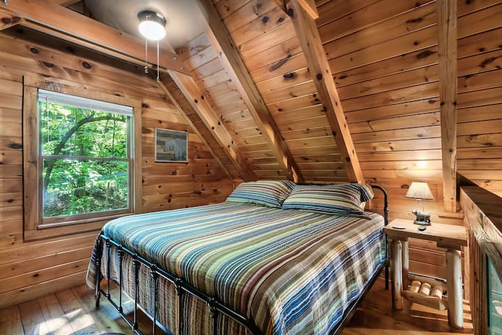 Loft sleeping area with Helix Sleep king mattress.