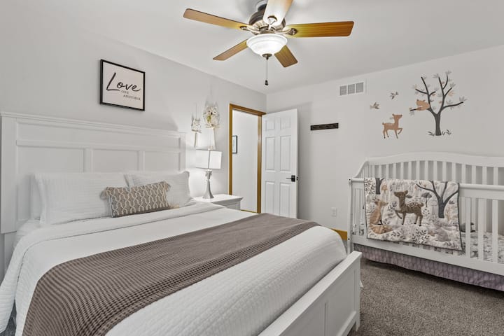 Main Floor: Bedroom 3: Queen Sized Bed and Crib