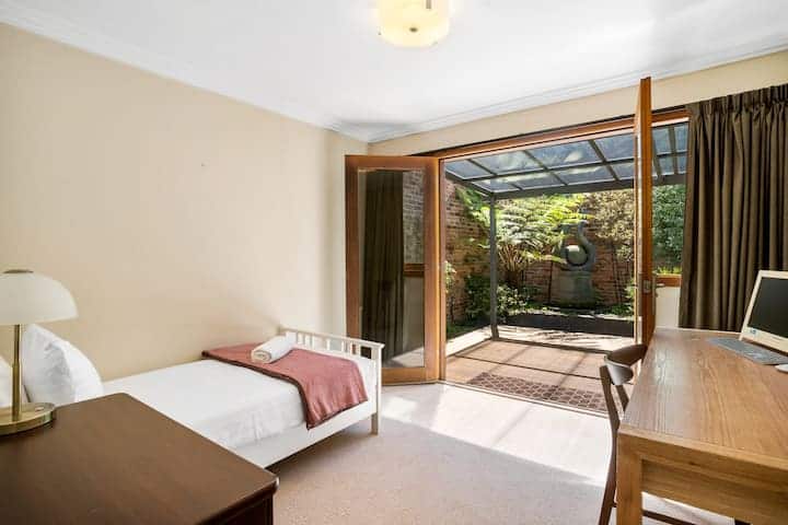 Bedroom 3 has a single bed and desk