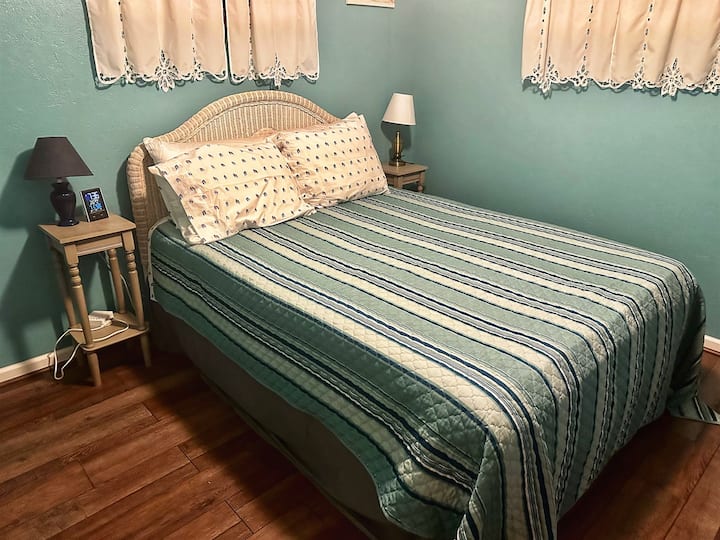 The Front Queen bedroom has a queen memory foam madrac, a dresser, closet, and 32" Roku ready led TV, and a sound machine to send you off to sleep with any of 6 different sounds.