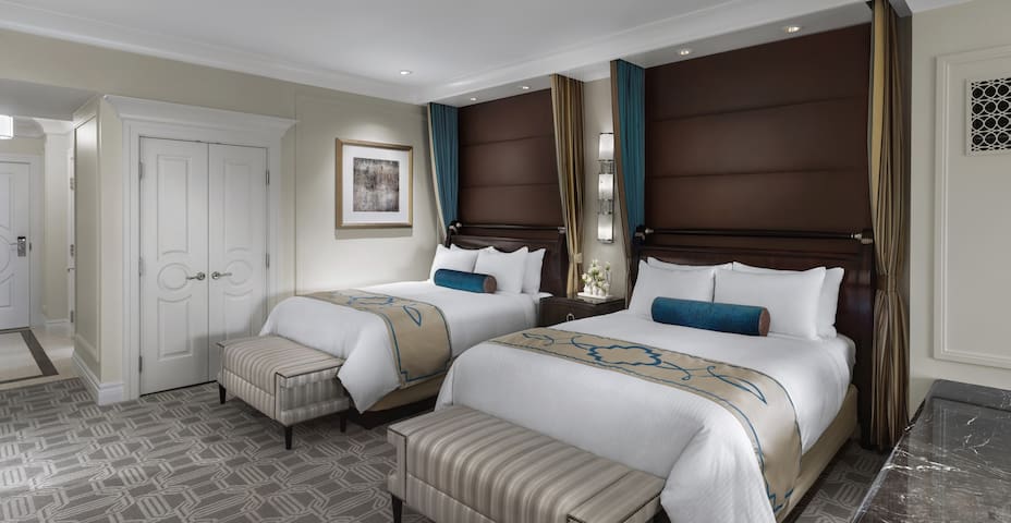 2 Connecting Hotel Suites – 5 beds