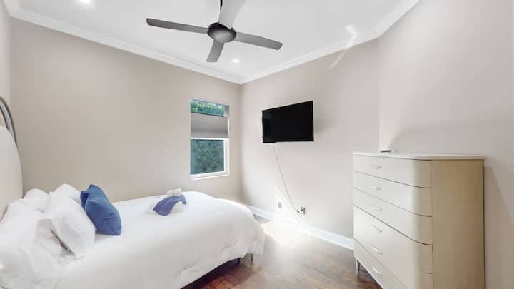 Clean, comfy bedroom w/ TV for laid-back evenings.