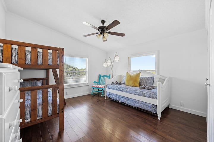 Sturdy bunk bed and a trundle bed totaling 4 twin sized mattresses