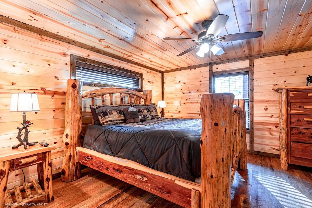 Main Level / Bedroom 1 with ensuite bath, dual vanities, closet and SmartTV