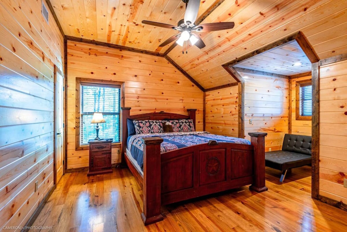 Upper Level - Bedroom 6 with ensuite bath,  sleeper couch, closet and TV