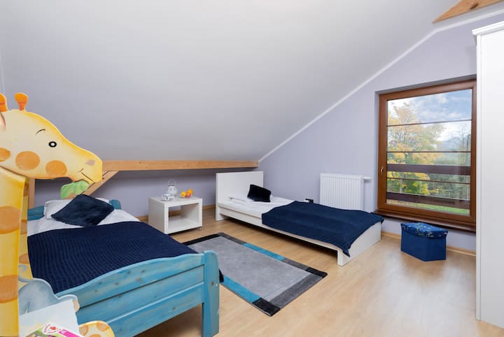 חדר שינה של בית נופש מלצ'ואו 5 עם 2 מיטות יחיד