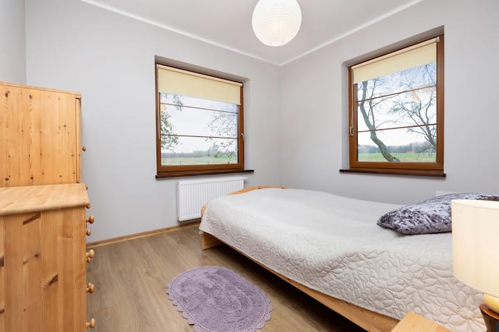 חדר שינה של בית נופש מלצ'ואו 5 עם מיטה זוגית