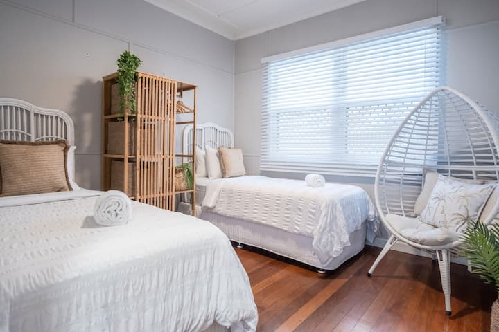 Bedroom two features two single beds.