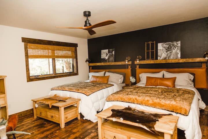 The downstairs reverse KC room has two queen beds, character, and storage. Pure linen sheets, goose down comforters, dog friendly pet blankets all make for the coziest sleeping.