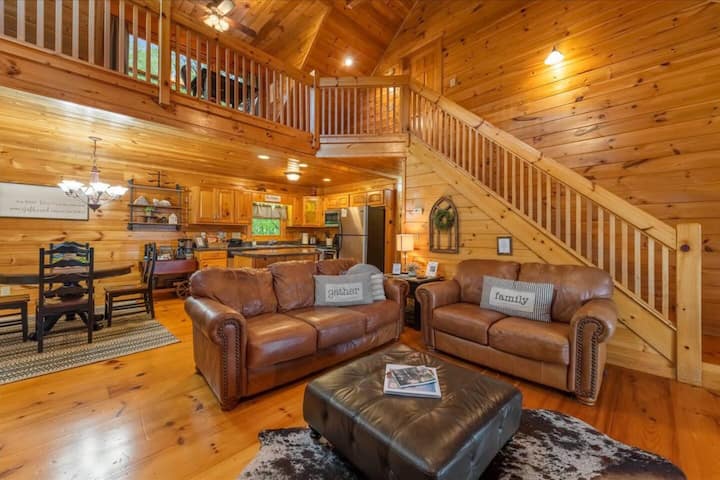 Cozy up and unwind in the heart of our cabin, where the living room offers the perfect retreat for relaxation and quality time with family and friends!
