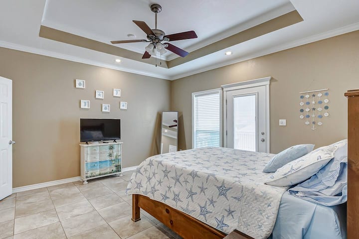 Relax at night in the master bedroom on the comfortable, cushy mattress.  This room also comes with a large smart TV