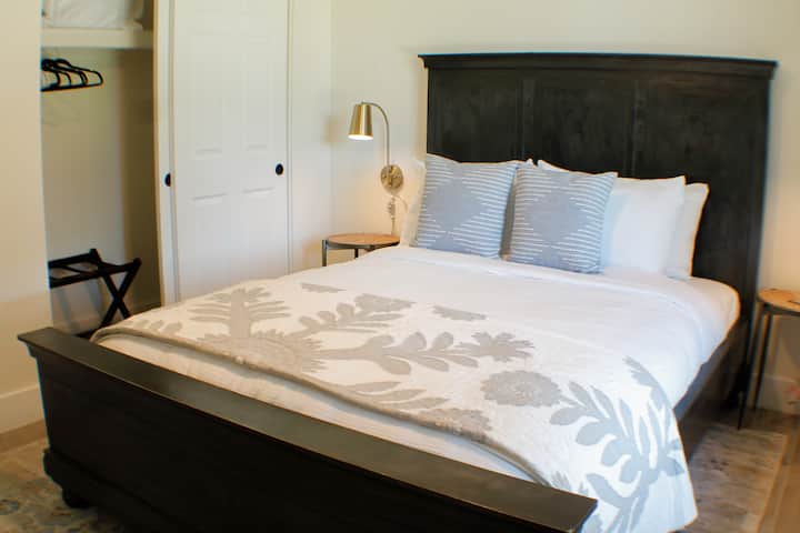 [Queen Bedroom 1] You will feel at home in the beautiful bedrooms and have everything you need including hangers, extra pillows, luggage racks, and plenty of storage.