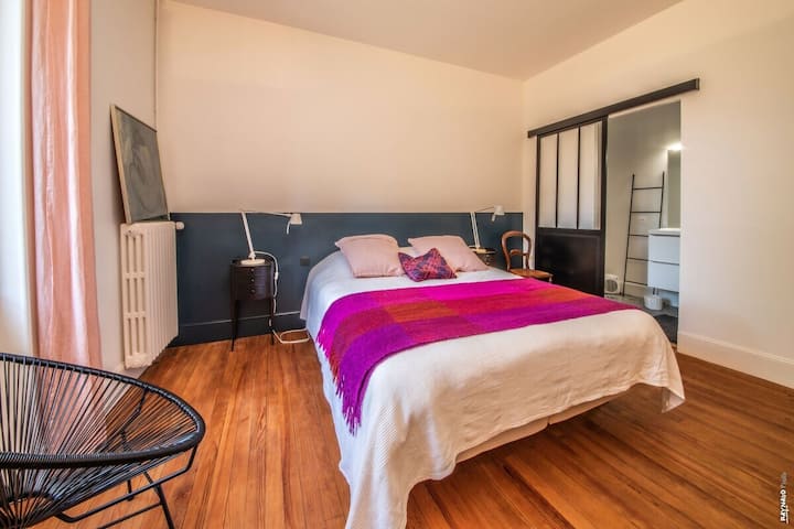 Bedroom with double bed and ensuite bathroom