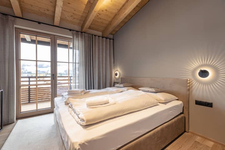 Example: Bedroom - penthouse Kröndl with fireplace