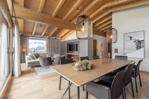 Erfolgreiche Airbnb-Immobilie: Penthouse with 3 bedrooms & fireplace in Westendorf