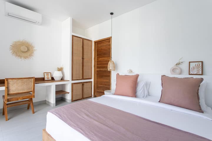 Guest bedroom #3 with a closet, working area, and ensuite bathroom