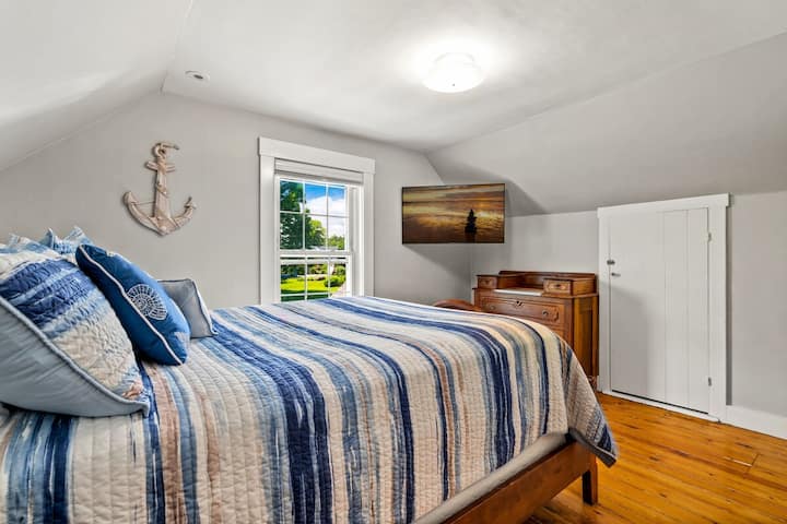 Second floor bedroom. Queen Bed, closet, and dresser. 
