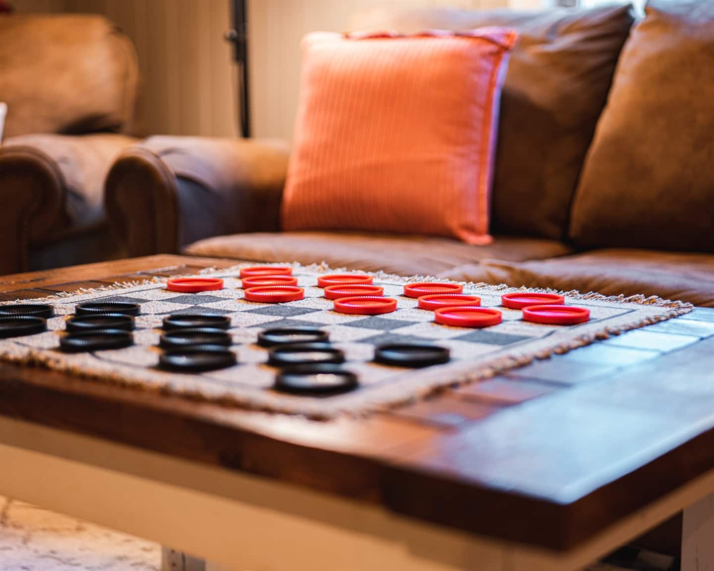 Challenge someone to checkers on the coffee table while the fire pops in the background.