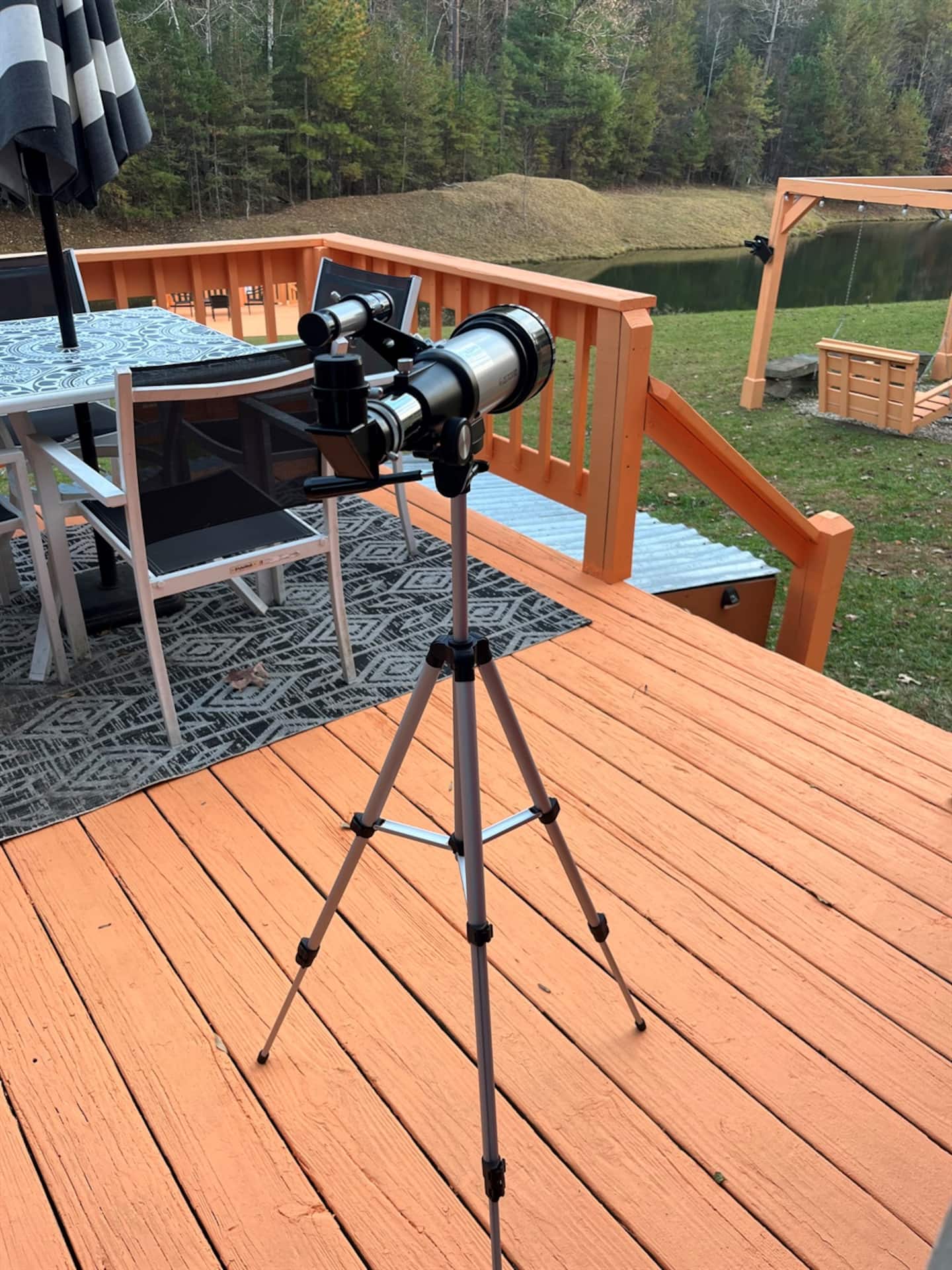 Set up the telescope on the deck once the sun goes down.
