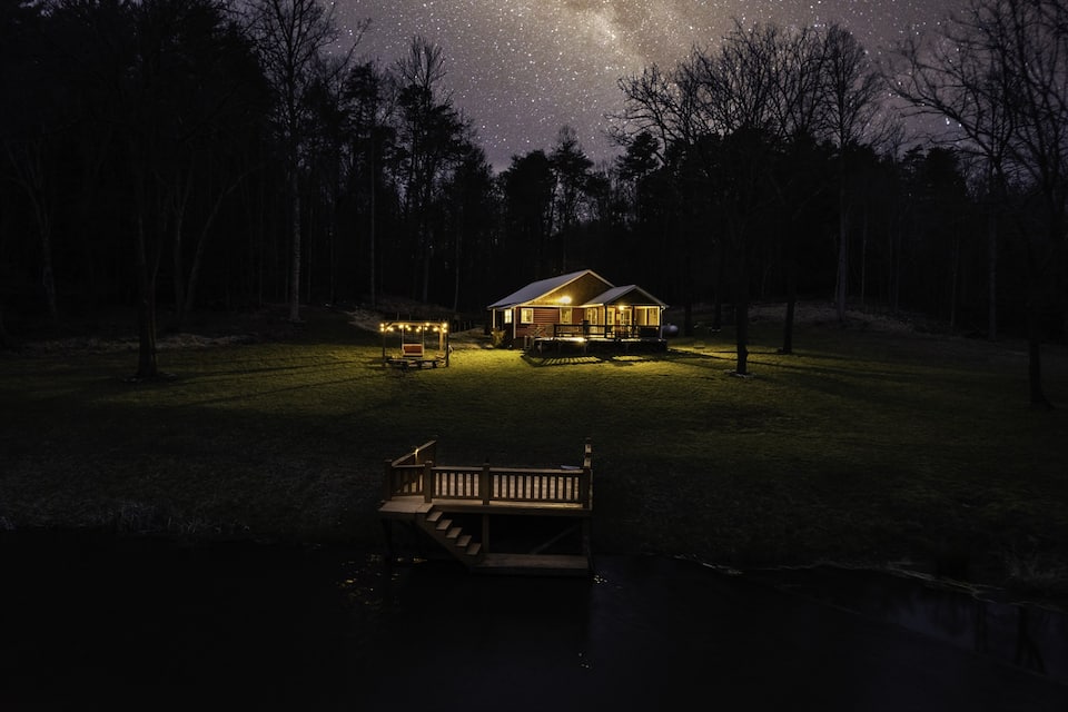 The dock after dark, with the whole sky showing up over the water