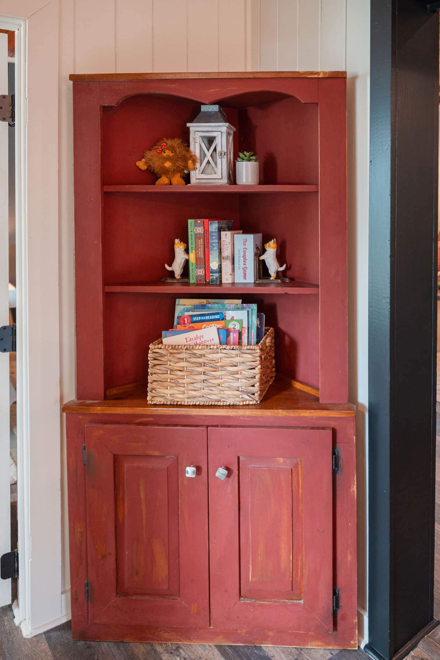 Grab a book from the corner shelf and let the little lantern light your reading nook.