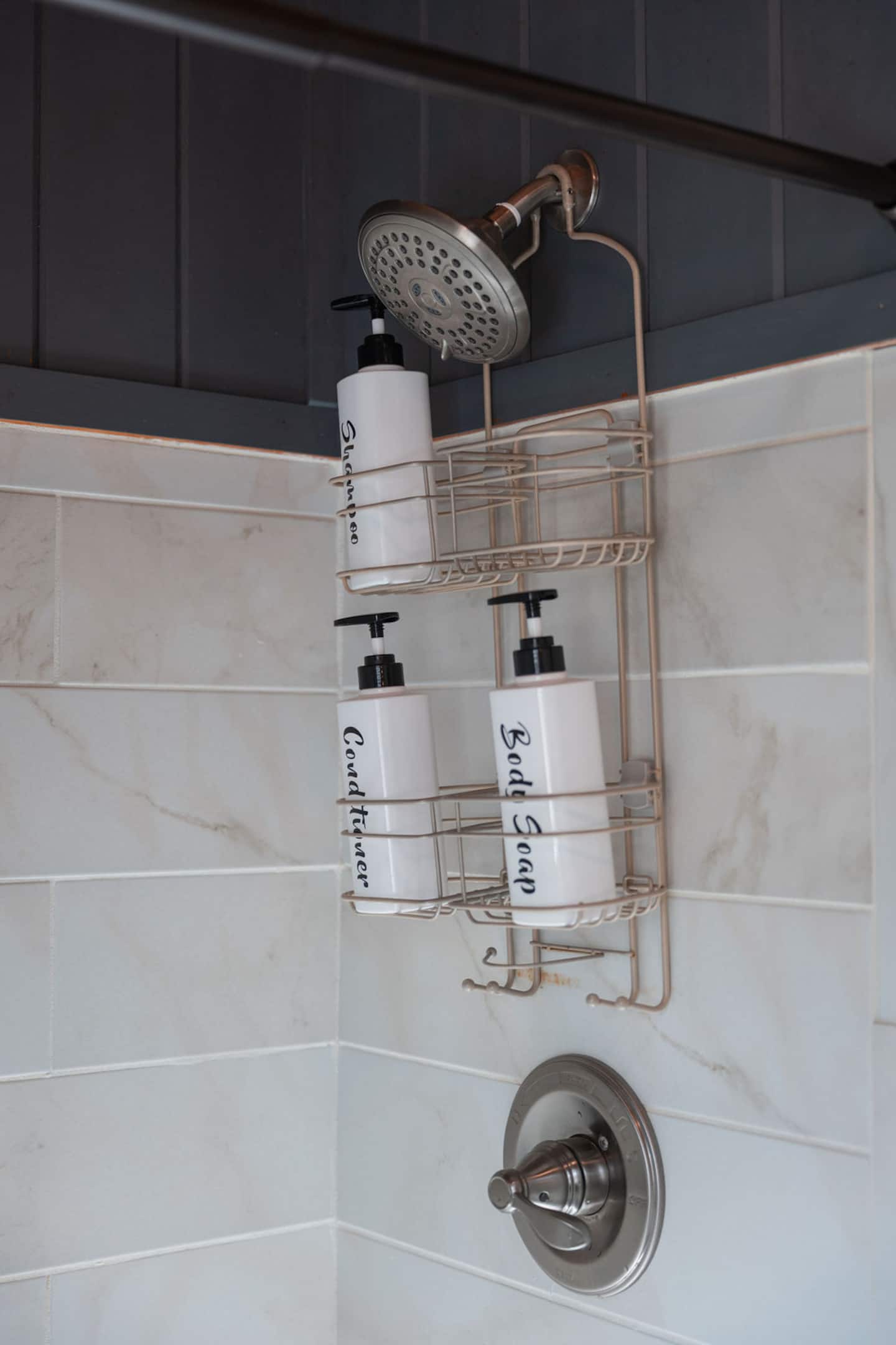 Rinse off under the showerhead with shampoo, conditioner, and soap already stocked.