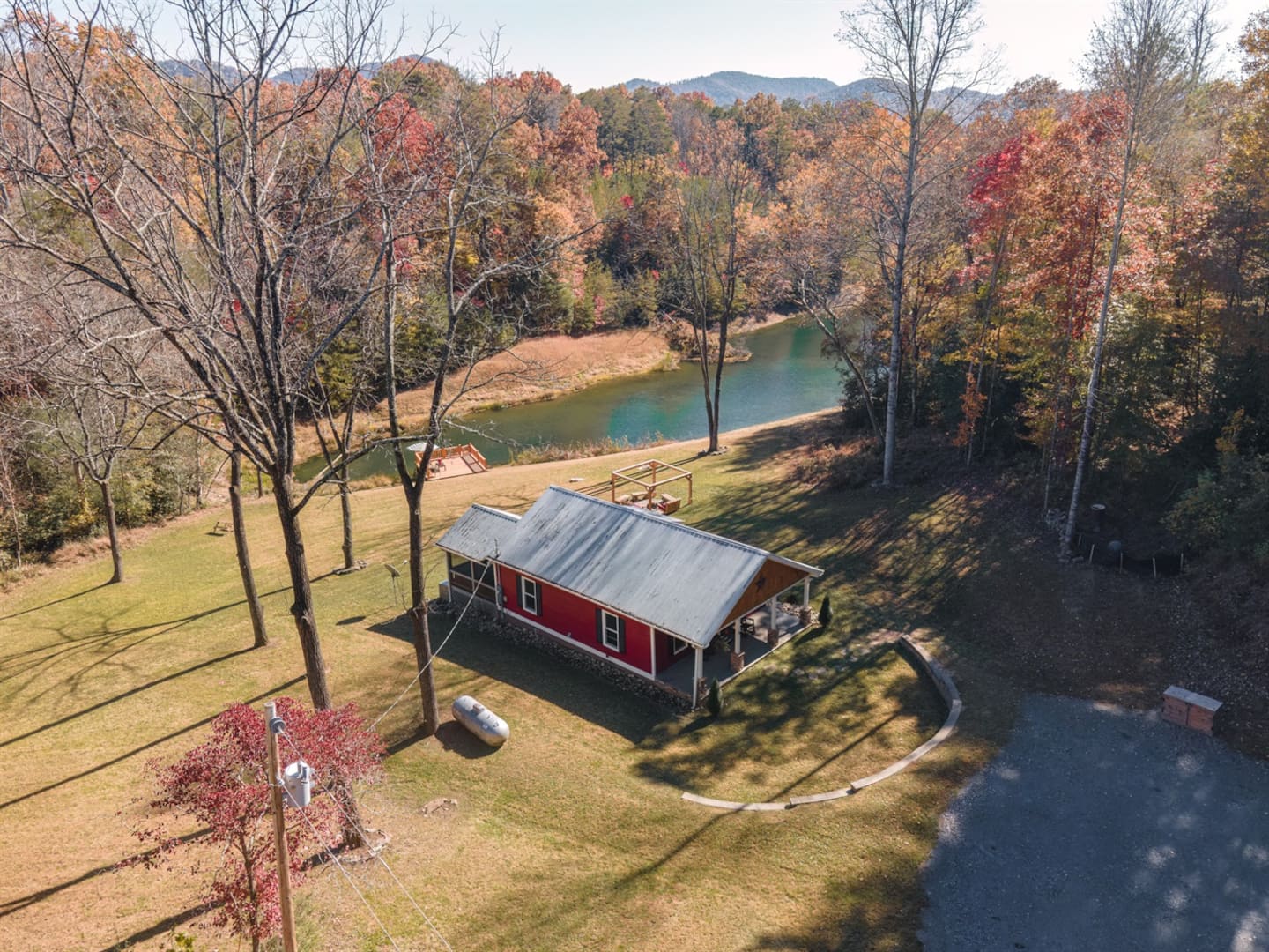 Watch the pond glow through the fall foliage the moment you turn down the driveway.
