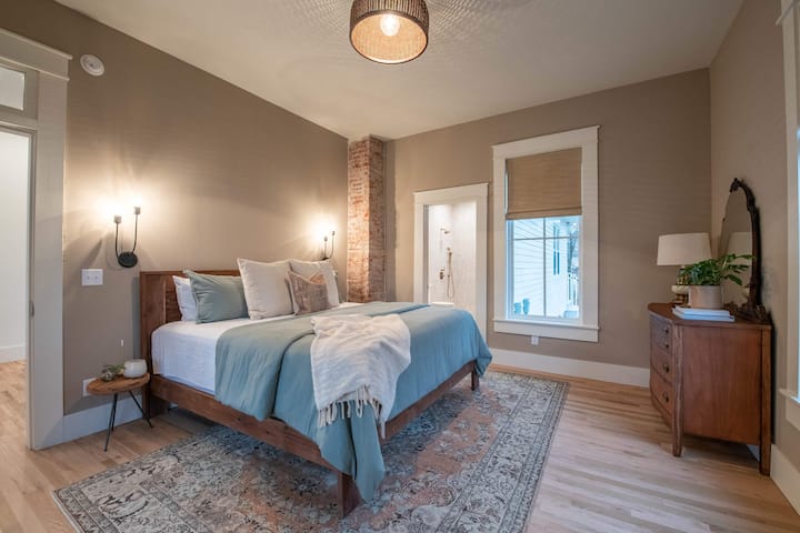 First floor bedroom - king bed and bathroom with shower