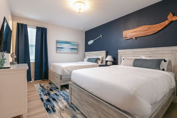 Enjoy a spring retreat in our spacious second-floor bedroom featuring two queen beds!  Perfect for families or friends, it’s a relaxing haven after a day of bright spring adventures and memorable moments.
