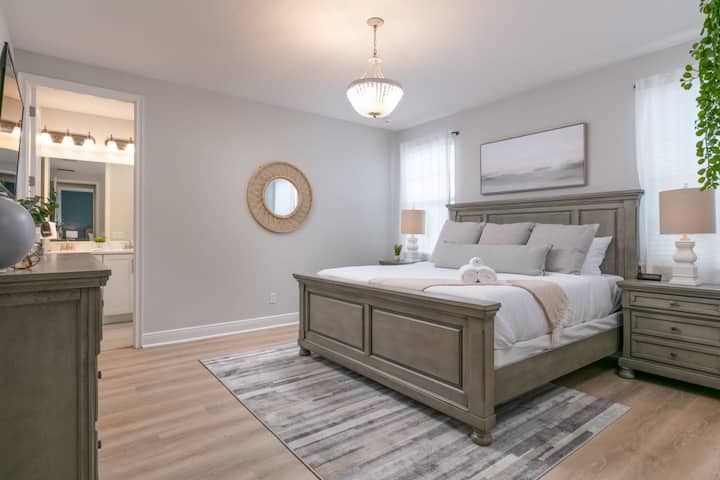Enjoy a luxurious spring retreat in our oversized master bedroom!  Located on the second floor, this spacious and elegant haven is perfect for relaxing, recharging, and enjoying peaceful moments away.