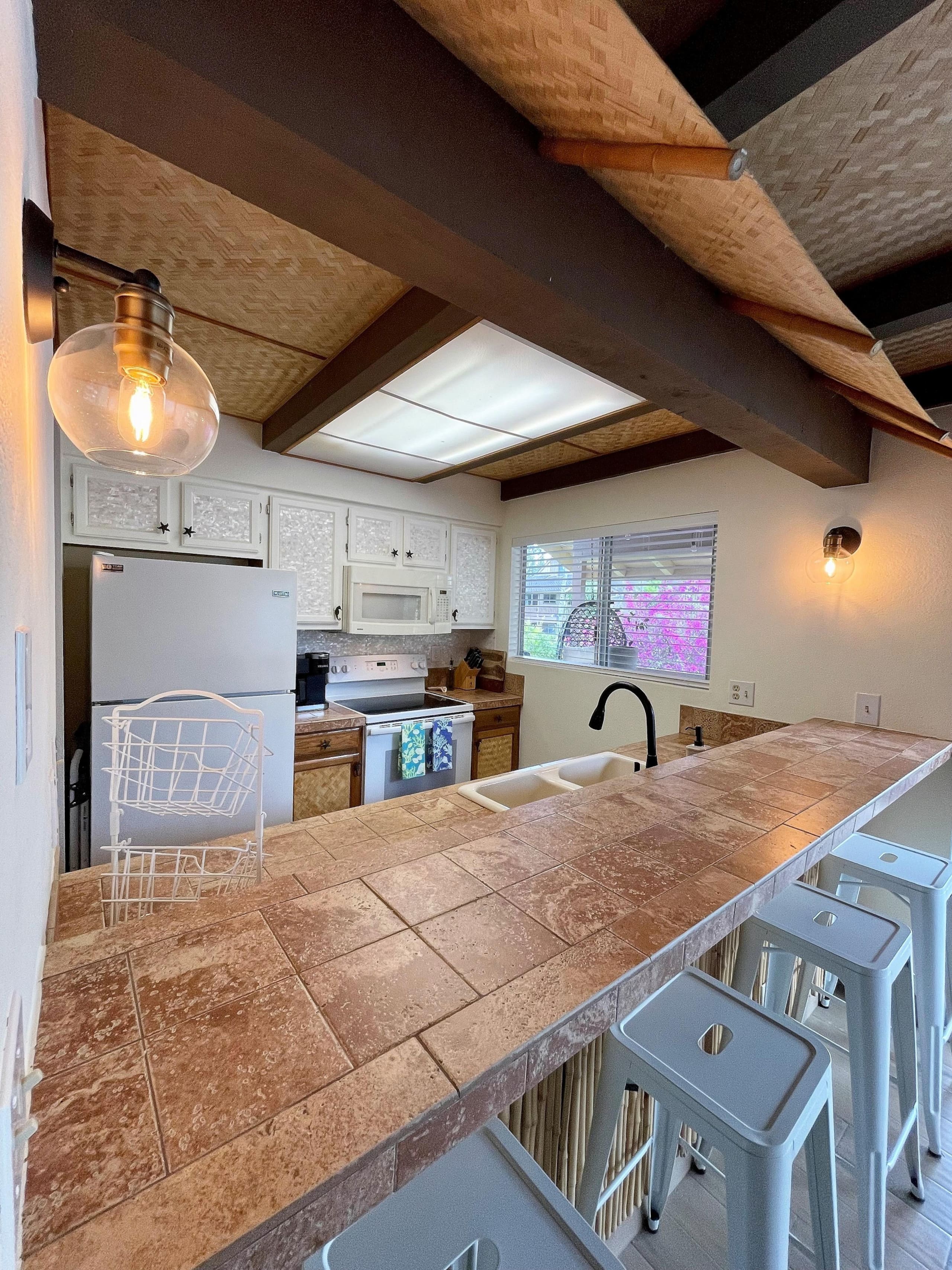 Beautiful Condo with Loft, Spacious Patio and A/C - Photo 12