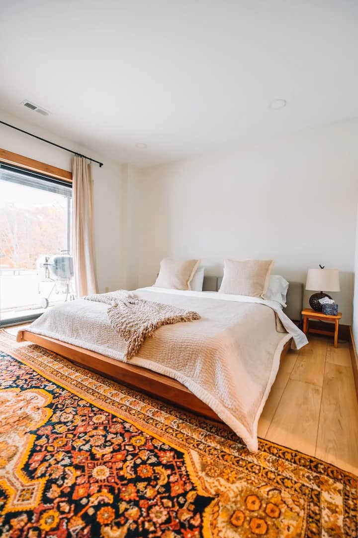 Downstairs bedroom with private attached in-suite bathroom located off game room/living room #2.