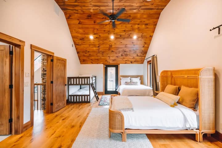 Bedroom #2 on the 2nd floor with 2 queens and full-size bunk beds.