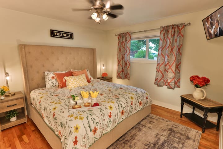 Main floor King bedroom #2 w/ closet and TV