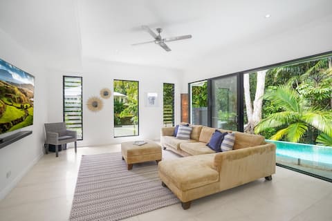 Popular Airbnb listing: Belle Escapes 58 Ocean Luxury Home Palm Cove in Palm Cove