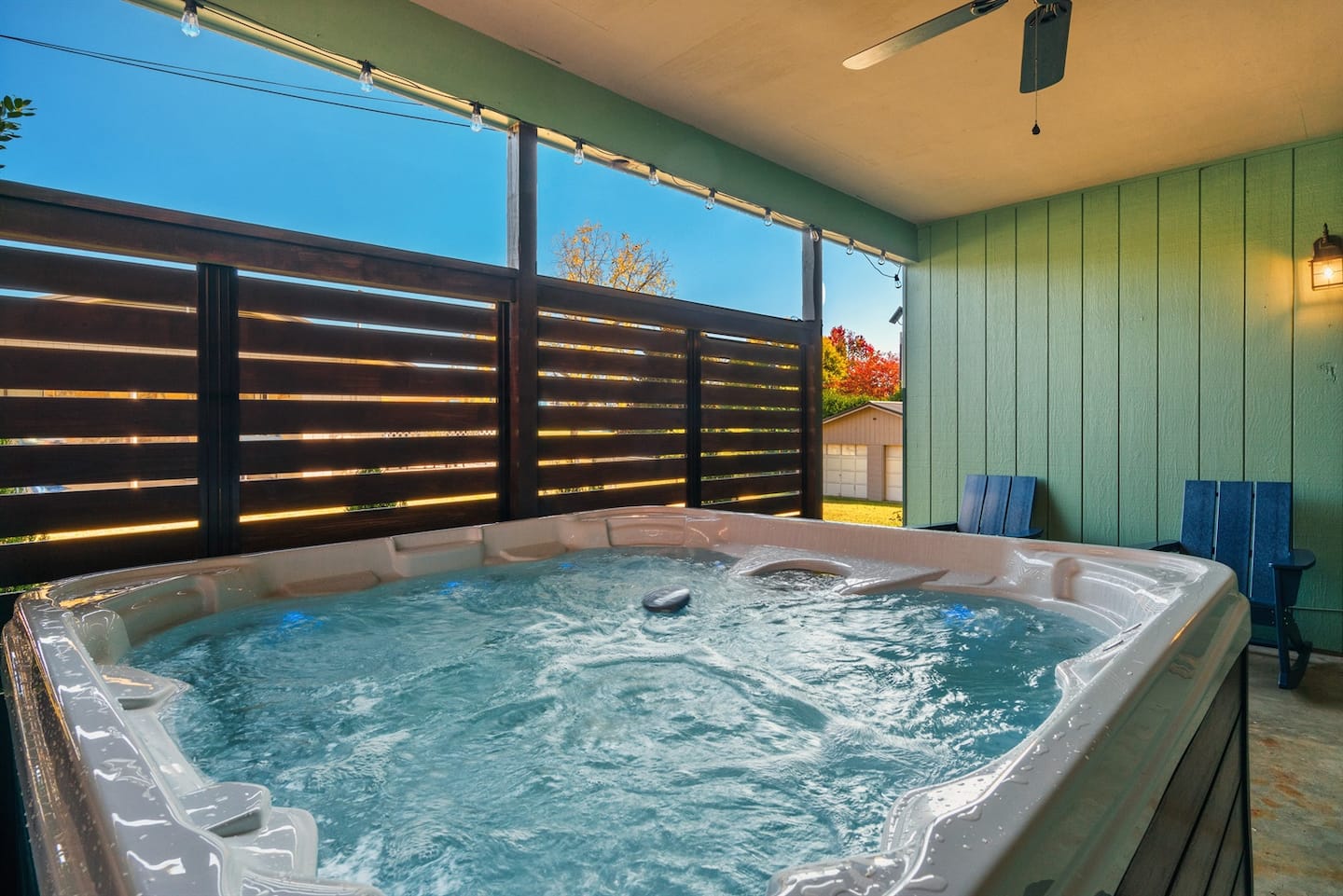 The covered hot tub in daylight