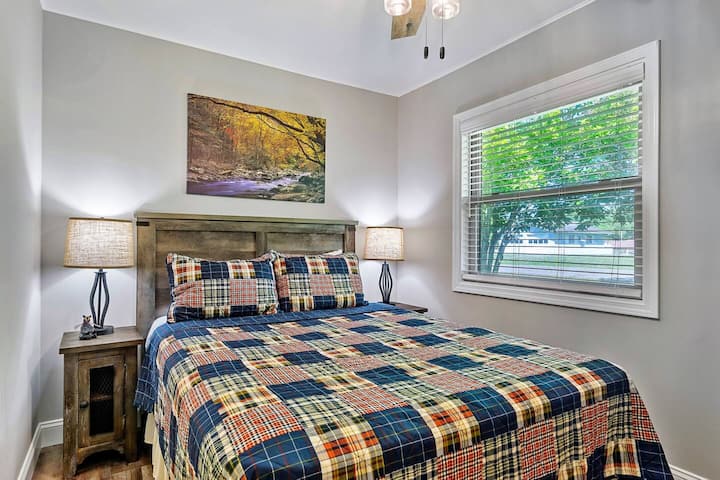 Third bedroom with queen bed and natural light