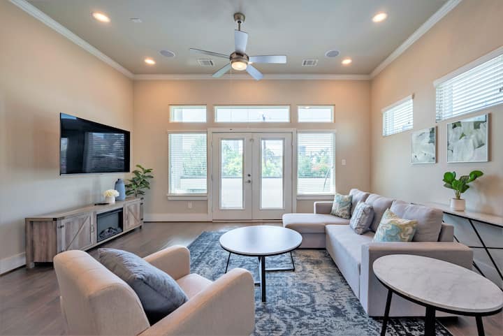 Spacious living room with a 65” HDTV equipped for streaming services like Netflix, Amazon Prime Video and Hulu. Media console also had an electric fireplace for the colder months.