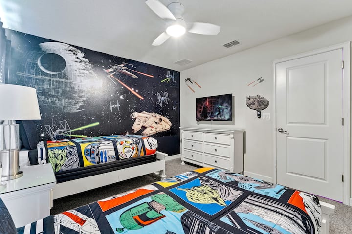 The ultimate Star Wars hangout! This room brings Star Wars to life with its epic space-themed decor. It has two twin beds and a TV for endless sci-fi fun!