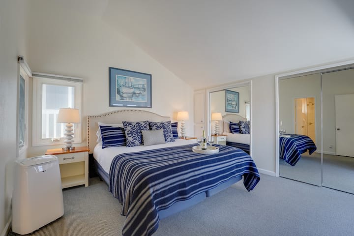 Peaceful and private, this inviting bedroom offers the perfect place to unwind after a sun-soaked day on the bay.