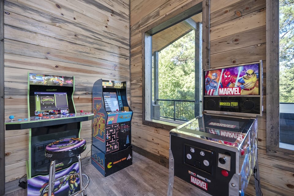 Game room with pinball, pool table and video games