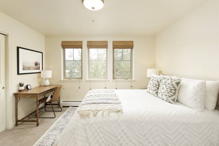 Beautiful master bedroom with desk and sitting area