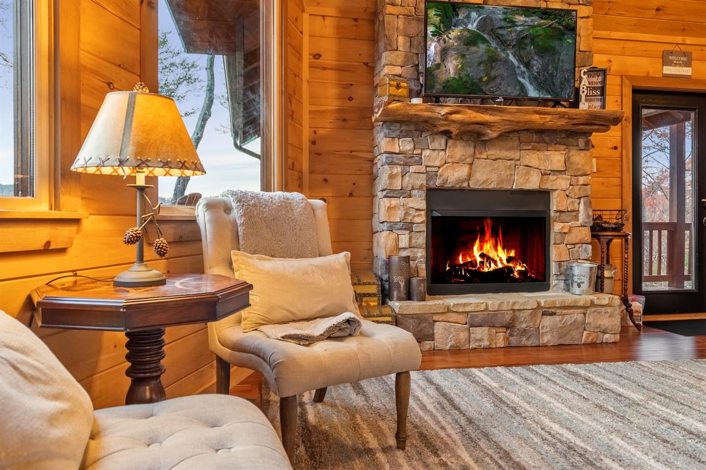 Cozy living room at Pine Cone Peaks with warm fireplace glow