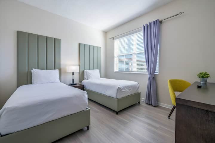 Dormitorio con dos camas individuales