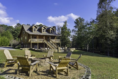 Large authentic 3-story log cabin adjacent to lake