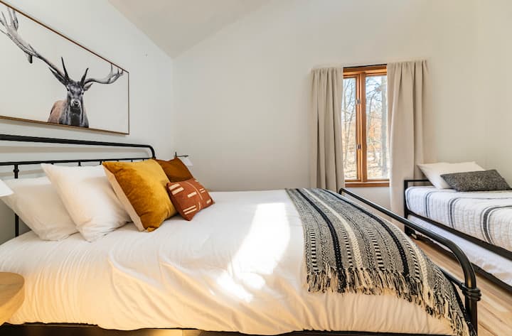 Queen, and two twin day bed located on the second floor