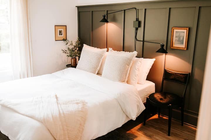Guest bedroom with queen bed on second floor 