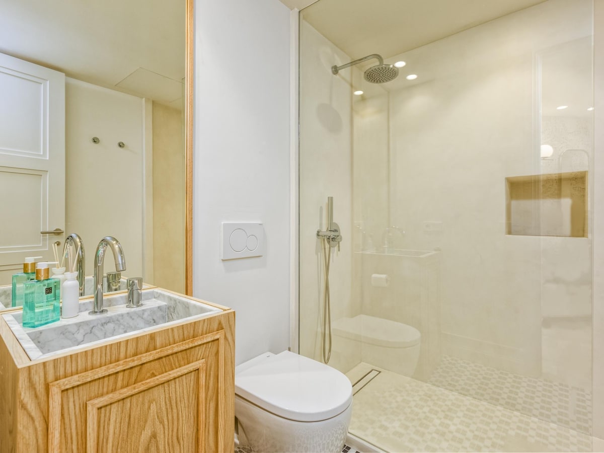Bathroom at Terraza Del Sol — rain shower, marble basin, Rituals toiletries
