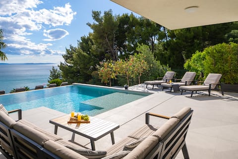 Seaview Villa ABA with heated pool,150m from beach