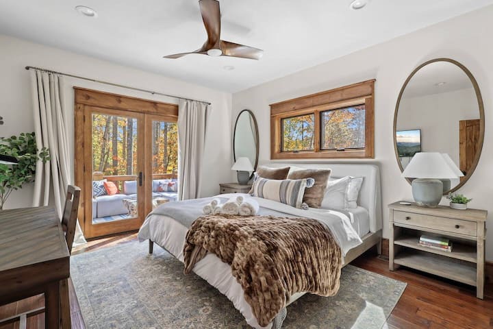 Luxury linens, calming colors - what's not to love about this master suite?